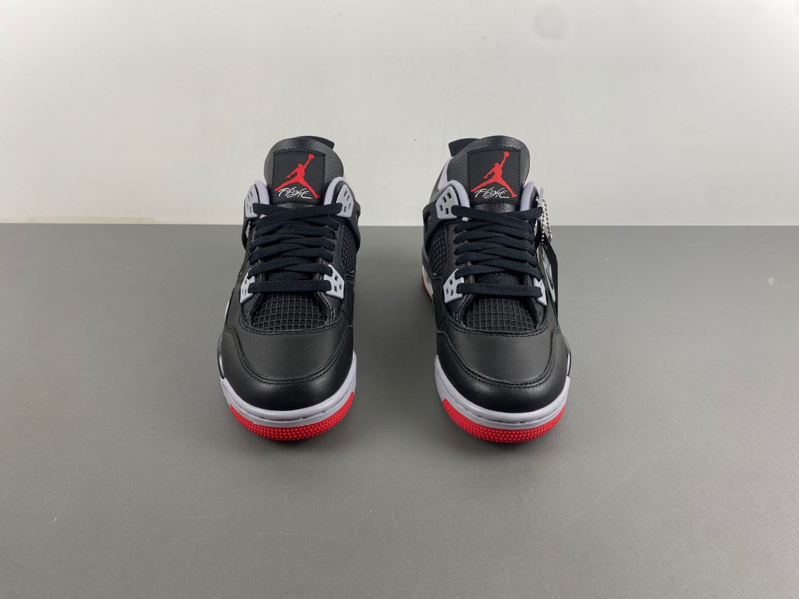 Air Jordan 4 Retro GS “Bred Reimagined” FQ8213-006 – “Redefining Heritage”